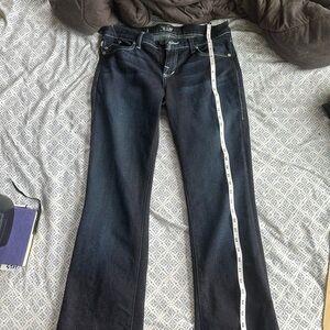 Low rise flare dark jeans.
